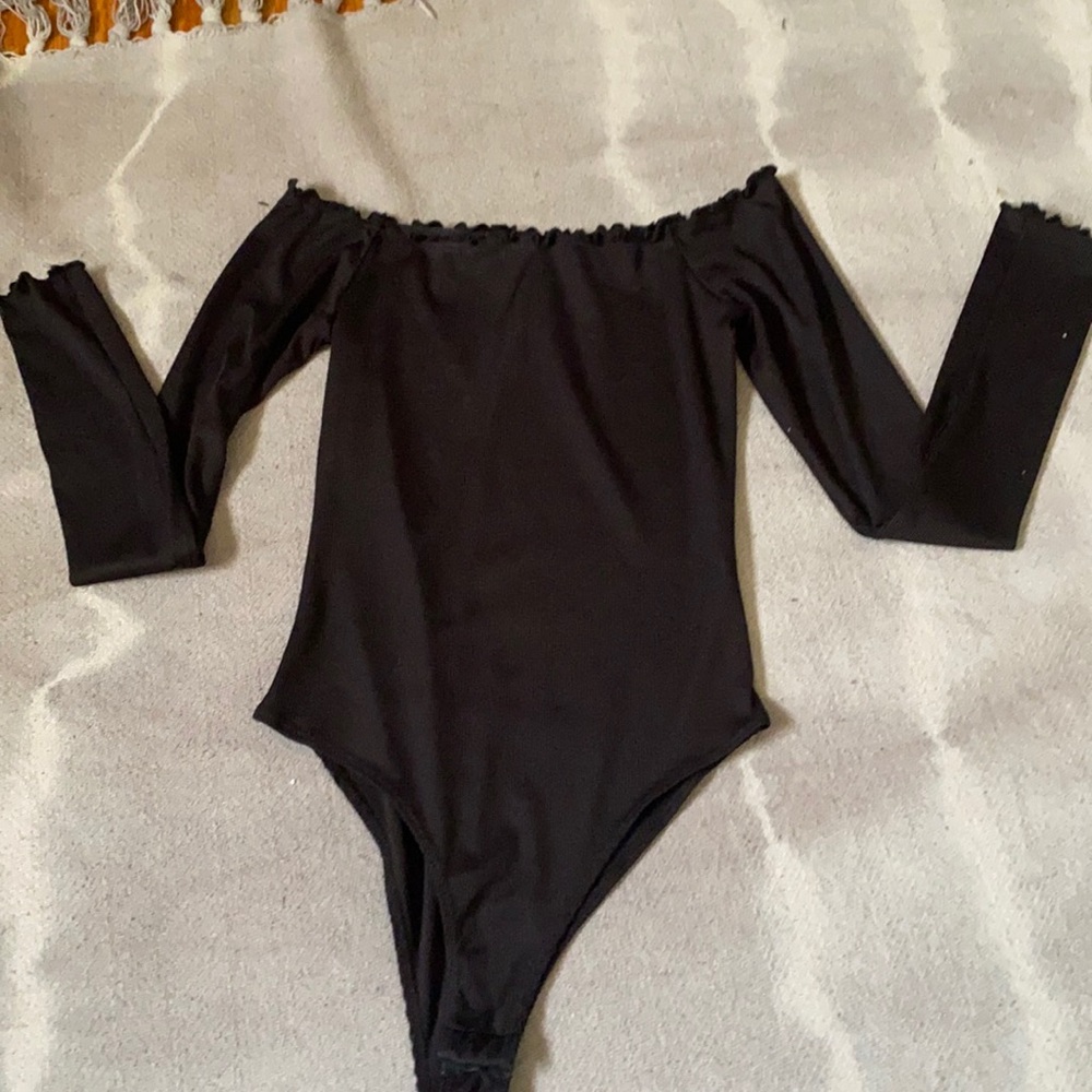 Black off the should longsleeve bodysuit